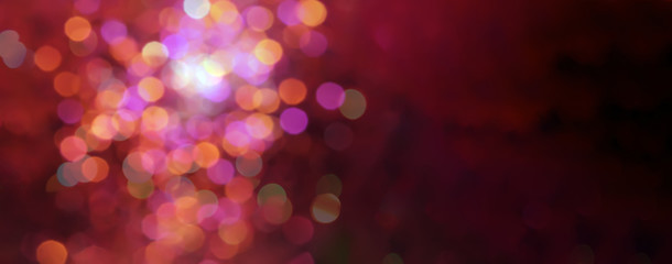 Red and pink soft defocused holidays lights background