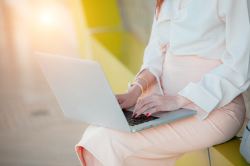 Fototapeta premium young woman working on her laptop 