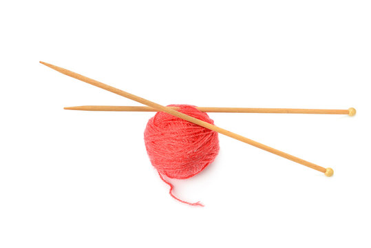 Ball of Yarn and Knitting Needles isolated on white background.
