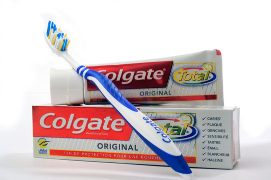 Tornac, France - november 9, 2014: Set of Colgate toothpaste with toothbrush on white background