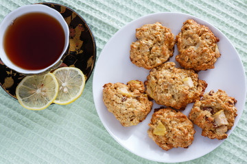 Oatmeal cookies with fruit ingredients raisins and apples