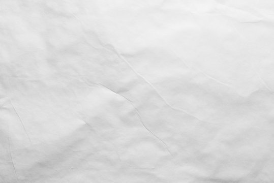 A white sheet of paper with slight bends.