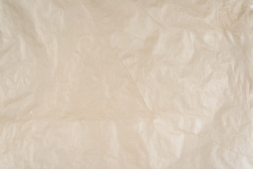A yellow sheet of paper with slight bends.