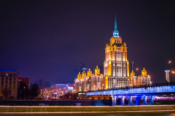 Fototapeta na wymiar Moscow. Russia. Hotels in Moscow. Lights of the night city. Moscow architecture. Buildings in Russia. Excursions in the night capital. Novoarbatsky bridge. Vacation in Russia. Night panorama