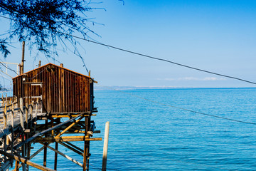 old fishing construction (Trabucco di Bricche) in the Adriatic Sea. Termoli, Italy