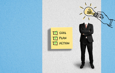 headless businessman with a lightbulb and sticky notes with list 