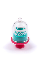 Childs toy plastic food molded 1/6th scale cake in a display case