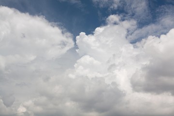 Naklejka na ściany i meble White cloud on the bottom blue sky
