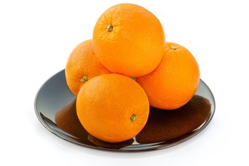 The oranges in the black plate white background