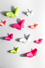 Multi-colored origami butterflies from above