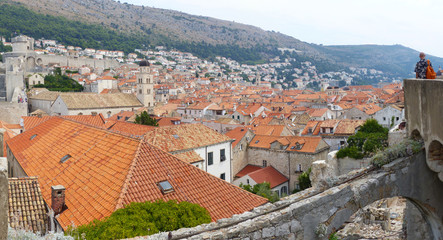 Fototapeta na wymiar Panoramic view from the wall of the old city of Dubrovnik, Ragusa, Dalmatian Coast, Croatia. UNESCO world heritages sites.