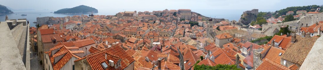 Fototapeta na wymiar Panoramic view from the wall of the old city of Dubrovnik, Ragusa, Dalmatian Coast, Croatia. UNESCO world heritages sites.