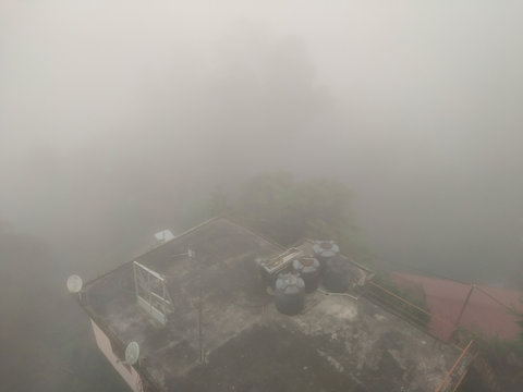 Buildings cover in cloud in the hill town kalimpong.