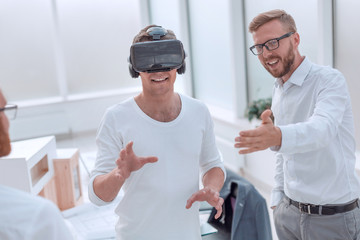 Fototapeta premium architects and designer using VR helmet in office