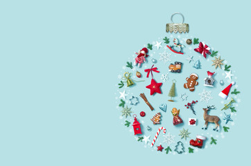 Christmas holiday background with objects in bauble ornament shape, top view
