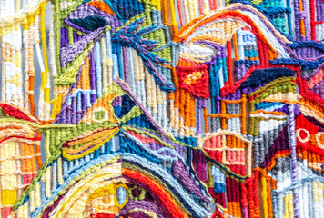 Woolen multicolored threads texture as background