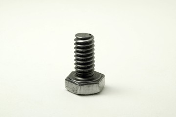 Metal bolts on white background.