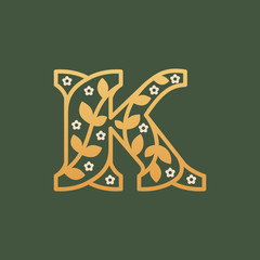 K letter logo consisting of floral pattern letters with chamomile flower.