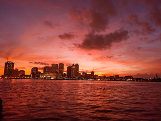 Fototapeta na wymiar Downtown New Orleans, Louisiana and the Mississippi River at twilight