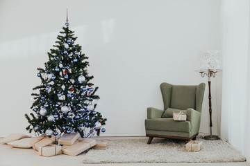 Christmas tree in a bright room new year gifts