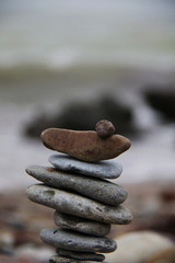 stack of pebbles on the beach closeup