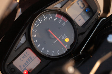 One black motorcycle in the desert.