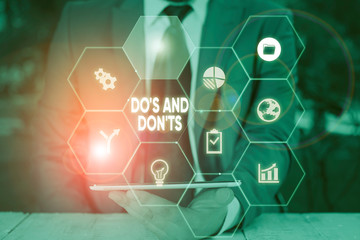 Word writing text Do S And Don tS. Business photo showcasing Rules or customs concerning some...