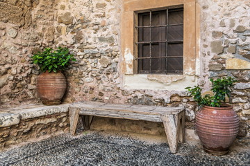 Fototapeta na wymiar Two flower pots in an old monastery