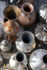 Obraz na płótnie Canvas Various vintage jugs of iron