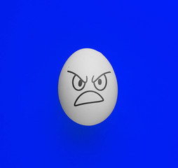 evil scary angry face emotion painted on the easter egg, halloween concept