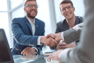 Tuinposter close up. successful business people shaking hands © ASDF
