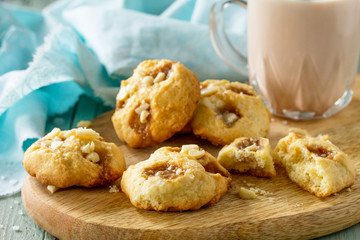 Baked Christmas cookies. Homemade Chip Cookies caramel salt and cocoa drink on wooden rustic table.