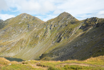 Breathtaking landscape in Carpathian mountains. With high green hills and rocks