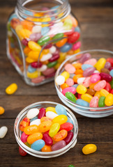Jelly beans in the glass bowl and jar