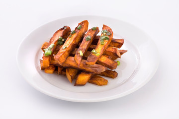 Boniato fritas, food on white table, ready to eat