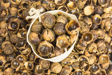 soap nuts - sapindus mukorossi - in a cotton bag