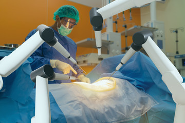 smart medical health care concept, surgery robotic machine use allows doctors to perform many types of complex procedures with more precision, flexibility and control than is possible
