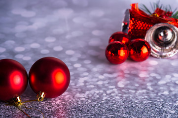 Christmas composition red bells and red balls on a gray background1