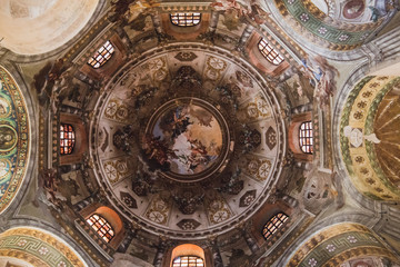 Obraz premium Ravenna, Italy - September 11, 2019: Interior of Basilica of San Vitale, which has important examples of early Christian Byzantine art and architecture. It was resignated as Unesco World Heritage. 