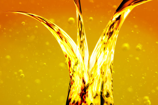  Liquid  yellow flows  on golden liquid with air bubbles , for the project, oil, honey, beer, fuel, gasoline, alcohol,carbonated drinks or other variants