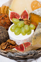 fruit and cheese basket, vertical closeup
