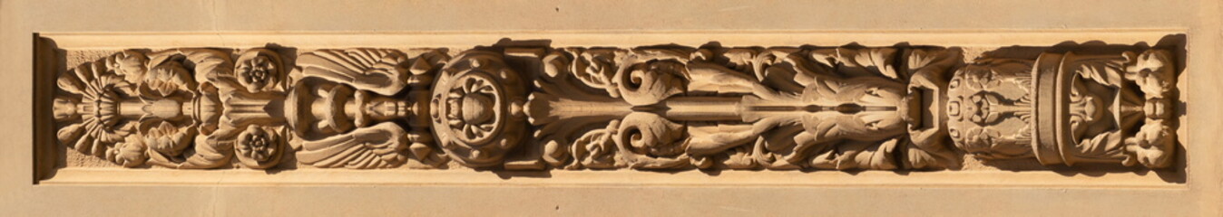 Elements of architectural decorations of old buildings, stucco gypsum, wall texture, stucco molding and patterns. On the streets in Georgia, public places. © Kozlik_mozlik