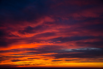 Sunrise with beautiful clouds over the city