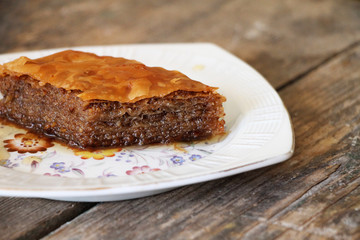 Baklava , traditional turkish desert on wooden table