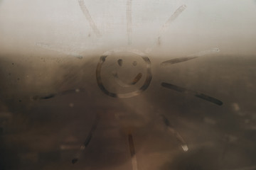 painted sun on the window 