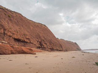 red cliff sea England 