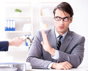 Businessmanbeing offered bribe for breaking law