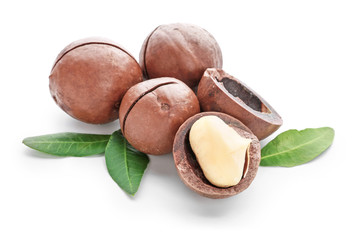 Tasty macadamia nuts on white background