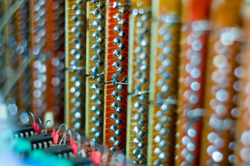Vintage electronic circuit boards with radio parts and chips, close-up, macro photo