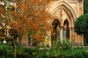 Cloister in autumn of the Mudejar Gothic Monastery of Guadalupe in Spain. World Heritage